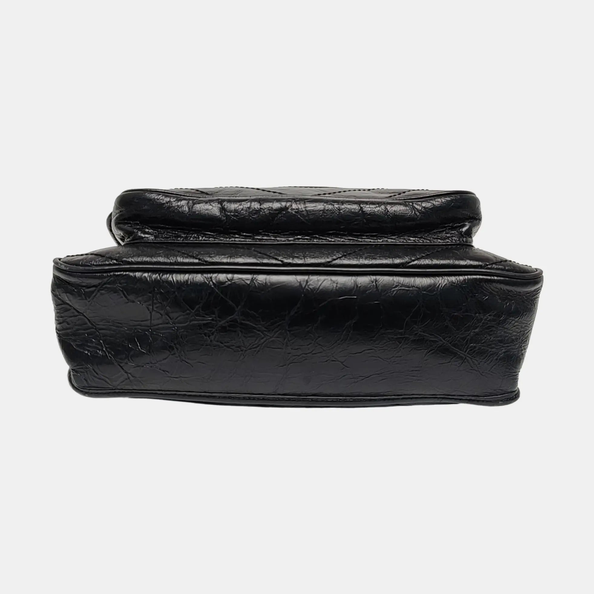 the bottom view of saint laurent NiKi Medium bag in soft black leather 